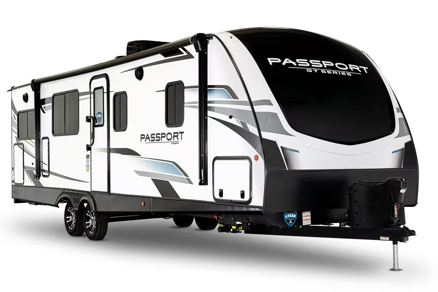 A cutout of a Grand Touring travel trailer from Keystone RV. 